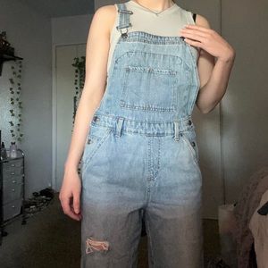 the coolest distressed denim pants overalls w a baggy fit